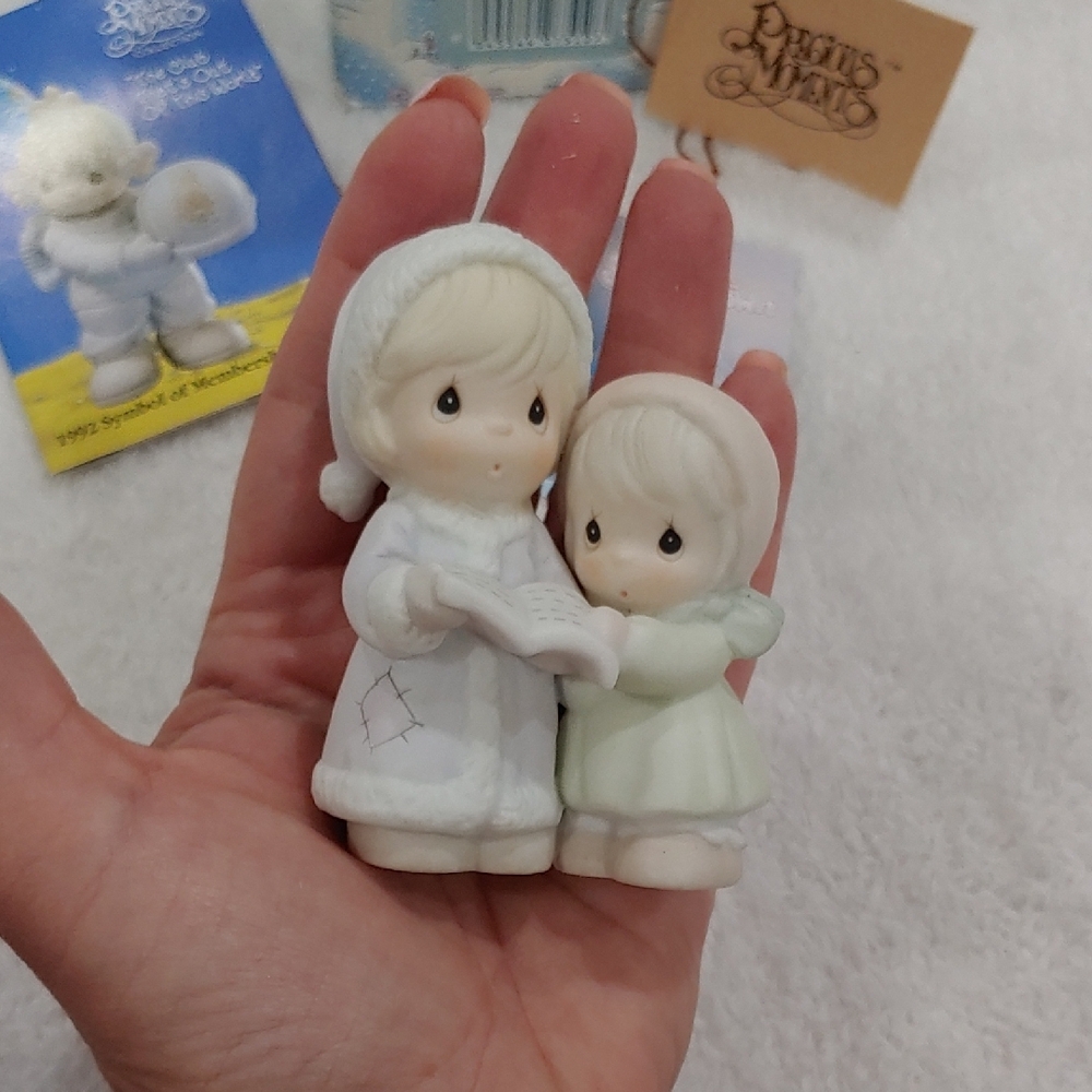 Precious Moments White and Cream Figurine